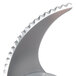 A silver knife with a serrated edge.