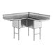 A stainless steel Advance Tabco three compartment sink with two drainboards.