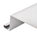 A white metal cover corner with a metal clip.