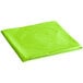 A green folded cloth on a white background.