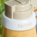 A Tablecraft plastic bottle collar with beige lettering that says "Fat Free" on a white background.