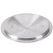 A silver stainless steel cover with a pointy design in the center.