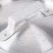 A Vollrath stainless steel pan lid with a handle.