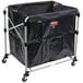 A black bag with a Rubbermaid logo on a metal frame.