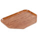 A trapezoid-shaped Java teak fiberglass tray with a handle.