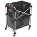 A black plastic bag on a Rubbermaid utility cart frame.