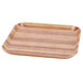 A square Cambro fiberglass tray with a wooden butcher block design.