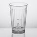 A clear GET SAN plastic tumbler with a straight rim and small bottom.