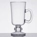 A clear Tritan plastic Irish coffee mug with a handle.