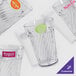 A close-up of a clear GET Tahiti plastic tumbler.
