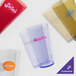A close-up of a clear pebbled plastic tumbler.