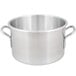 A close-up of a Vollrath Wear-Ever aluminum sauce pot with a curved edge.