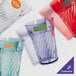 A close-up of a clear customized plastic tumbler.