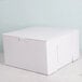 A white bakery box with a lid.