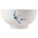 A white melamine bowl with blue bamboo designs on it.