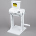 A white Weston Manual Meat Tenderizer with yellow accents.