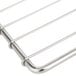 A stainless steel wire oven rack with a handle.