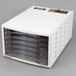 A white Weston 6-tray food dehydrator.