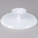 A white plastic Fineline cake stand with a white plastic tray.