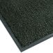 A Forest Green Notrax carpet entrance mat with a grey border.