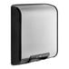 A silver Bobrick surface mount hand dryer with black trim on a white background.