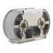 A silver metal Bobrick ClassicSeries surface mounted twin jumbo roll toilet tissue dispenser with two large round holes.