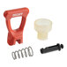 A red plastic Bunn faucet repair kit with a spring and a screw.