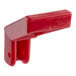 A red plastic Bunn faucet handle.