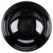 A Tablecraft black melamine bowl with a circle in the middle.