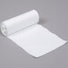 A roll of white plastic trash bags.