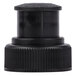 A close-up of a black plastic cap on a white surface.