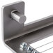 A metal corner with bolts and nuts.