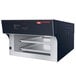 A black and silver Hatco Flav-R-Savor pass-through heated air curtain on a counter.