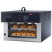 A Hatco Flav-R-Savor pass-through heated air curtain holding bread in a bakery display.