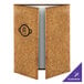 A brown cork gatefold menu cover with a logo on it.