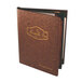 A brown Menu Solutions cork menu cover with gold text.