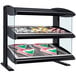 A black Hatco heated display case with food on a counter.