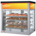 A Hatco Flav-R-Savor countertop display case with pastries inside.