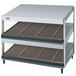 A white Hatco Granite Glo-Ray countertop merchandiser with slanted double shelves.