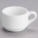 A white Tuxton espresso cup with a handle.