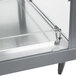 A stainless steel Hatco countertop food warmer with a glass door.
