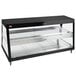 A black stainless steel Hatco countertop food warmer with glass shelves in a bakery display case.