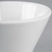 A close-up of a Tuxton Linx bright white bouillon cup with a small rim.
