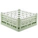 A light green plastic Vollrath glass rack with 25 compartments.