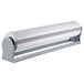 A Bulman Deluxe paper dispenser holding a roll of white paper.