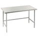 An Advance Tabco stainless steel work table with metal legs.