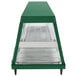 A green and stainless steel Hatco food warmer with glass shelves and doors.