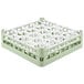 A Vollrath lemon drop glass rack with a green base and white dividers.
