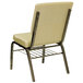 A beige church chair with a metal frame and cushion.