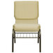 A beige church chair with a gold metal frame and a communion cup book rack.